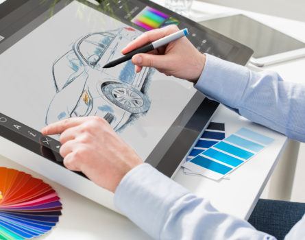 Graphic designer drawing a car