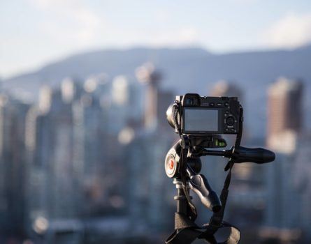 Camera taking a picture of the city from a distance